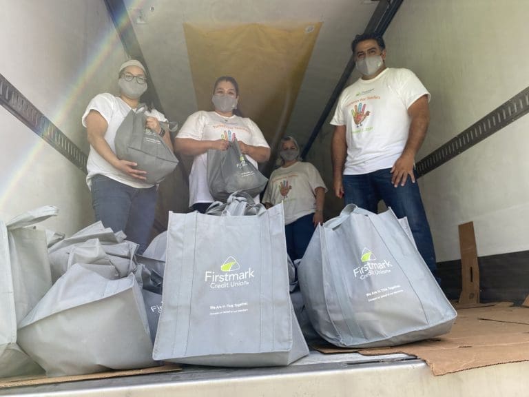 Volunteers with Frozen Turkeys