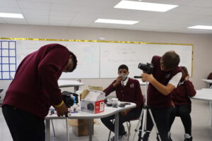 Students working with camera equipment