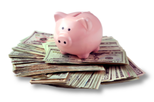 Piggy bank sitting on a pile of money